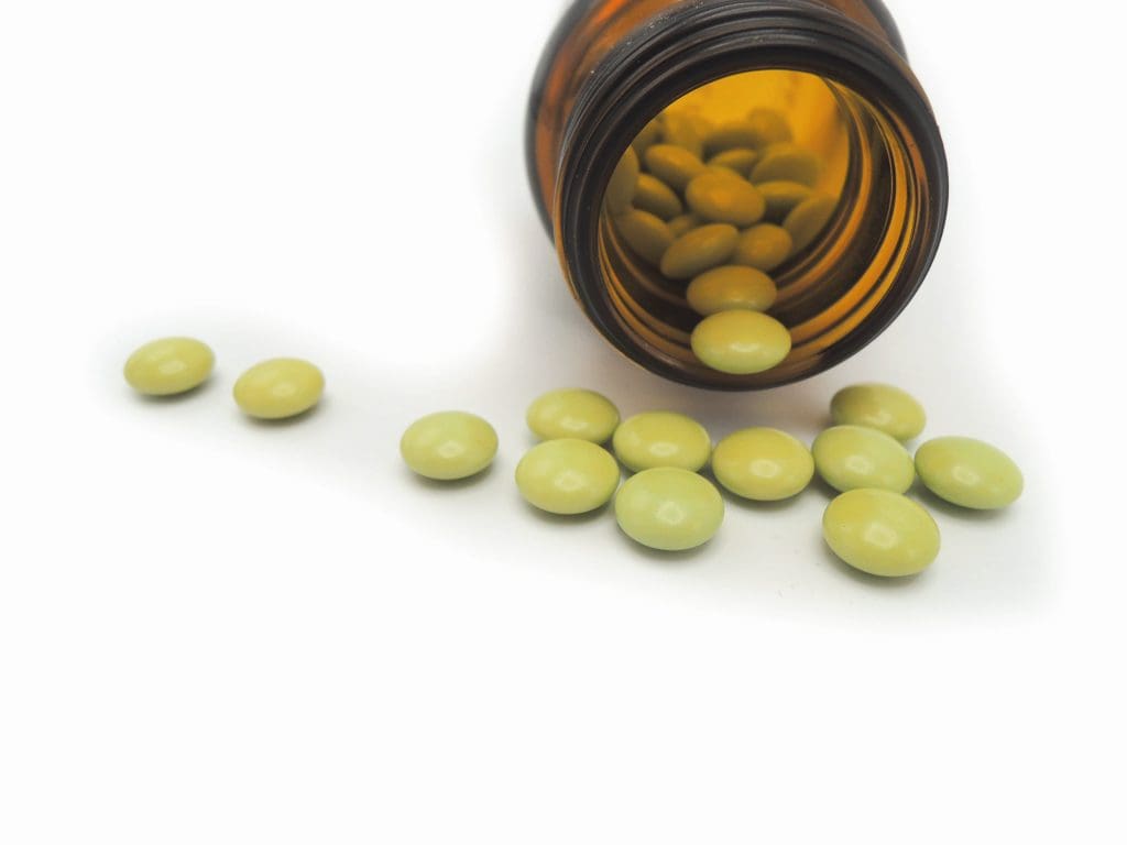 Librium detox pills spilling out a medicine bottle